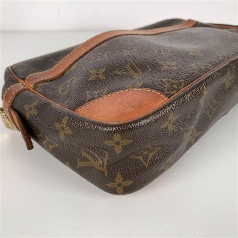 louis vuitton clutch toiletry bag|louis vuitton vintage monogram clutch.